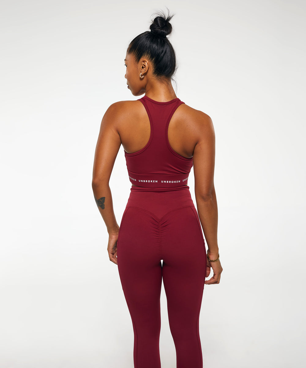 STRONGER Crop Top in Berry