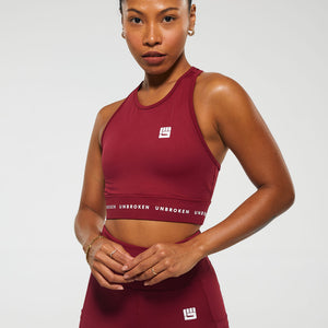 STRONGER Crop Top in Berry