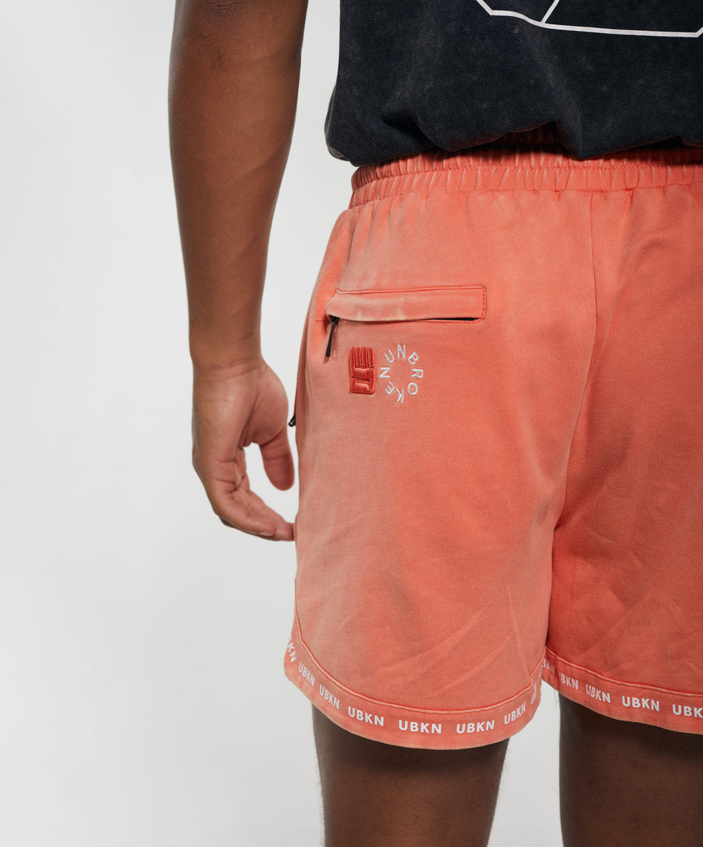 FLOW Mid Sweat Short in Coral Wash